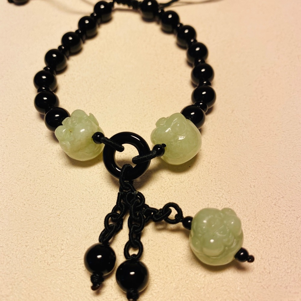 Hand carved and knitted jade bracelet
